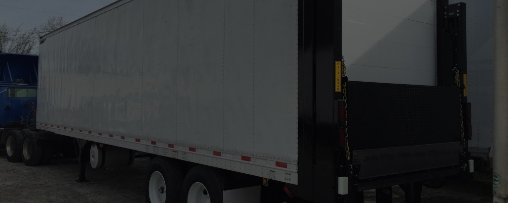 White Trailer with liftgate Equipment