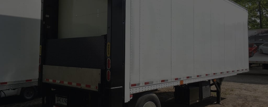 White Trailer with liftgate Side Angle